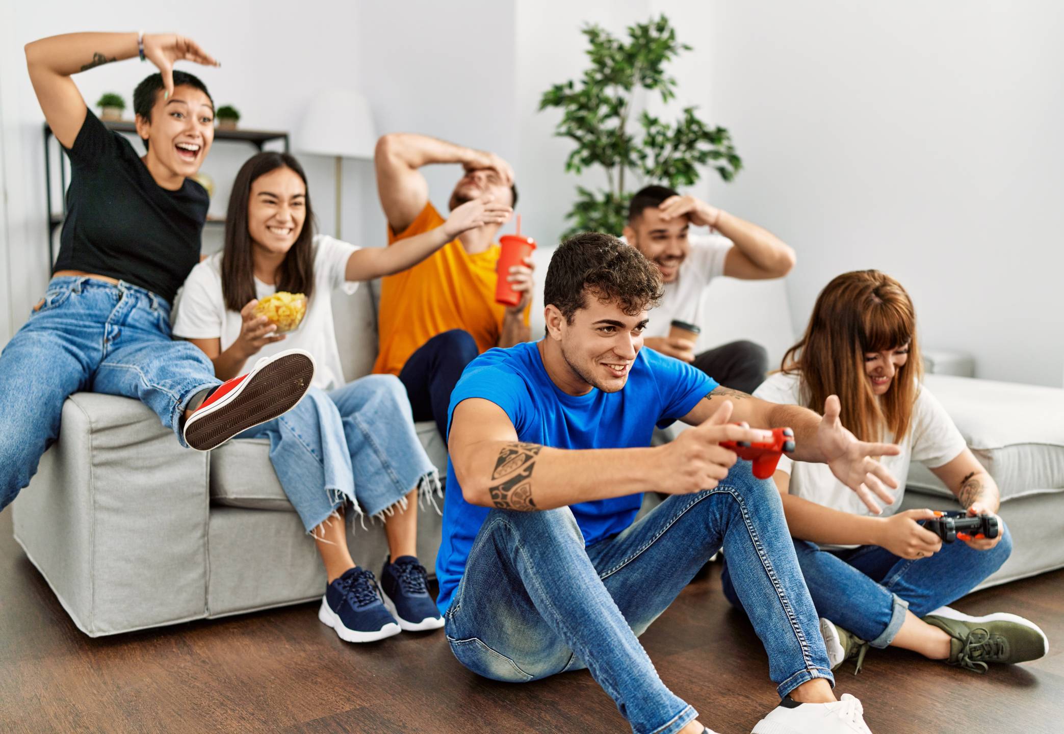 group of teens hanging out on the couch